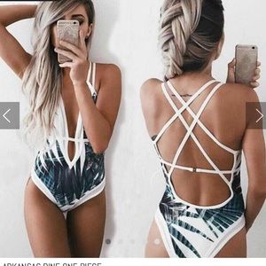 One piece swim suit. New without tags